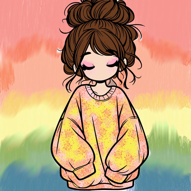 girl with baggy sweatshirt and messy bun