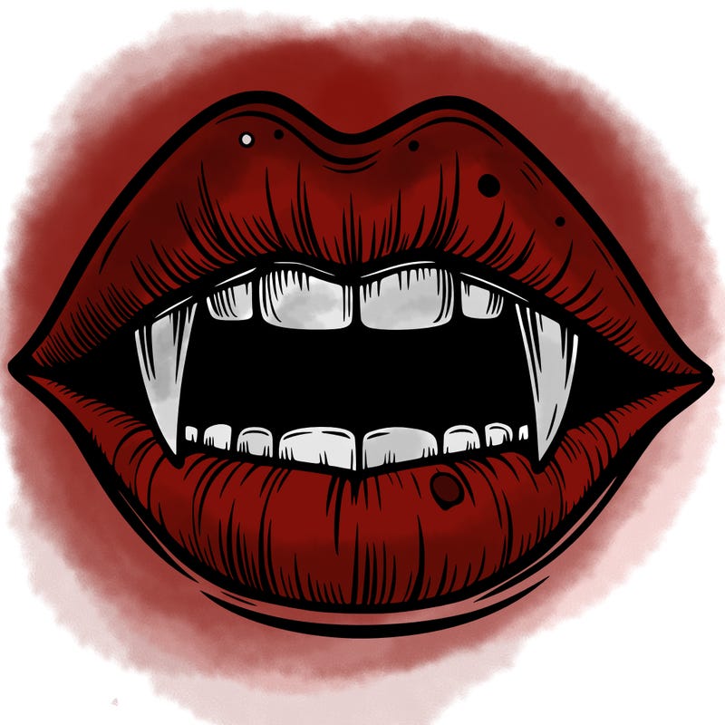 lips with vampire teeth