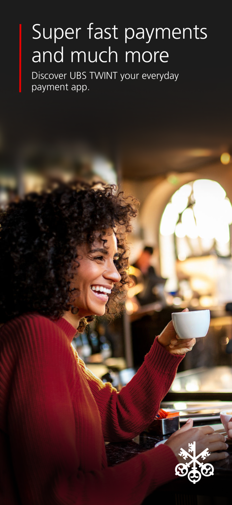 A woman smiling while holding a cup of coffee in a cafe representing the UBS TWINT mobile payment app