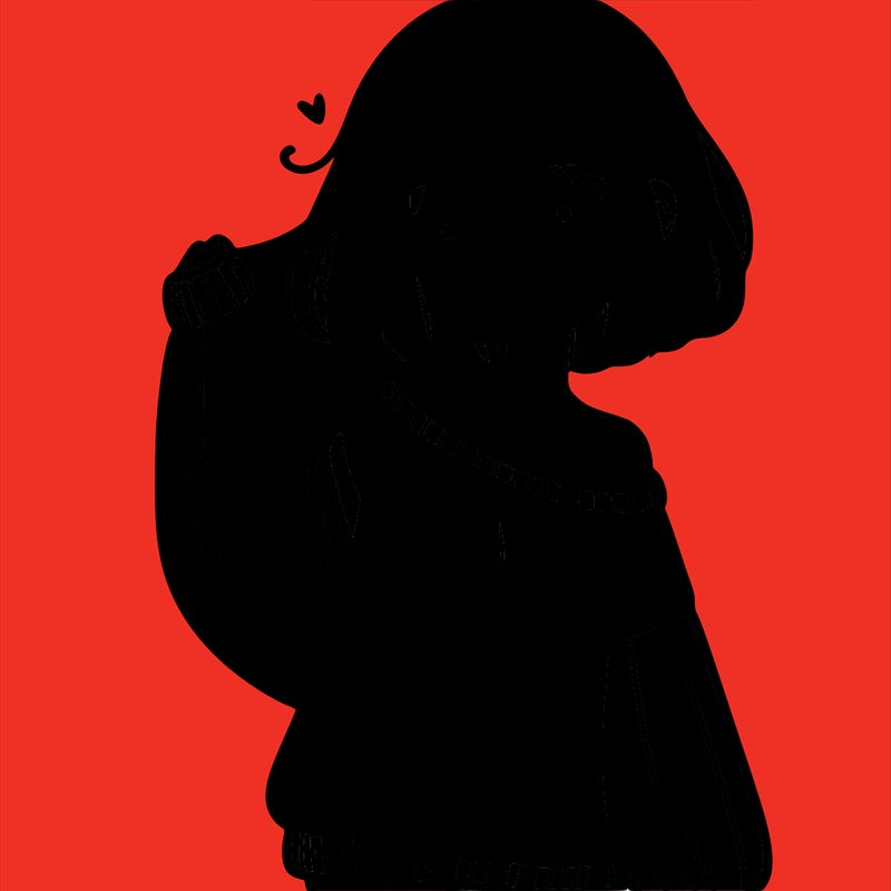 girl in baggy sweater hanging off her shoulder