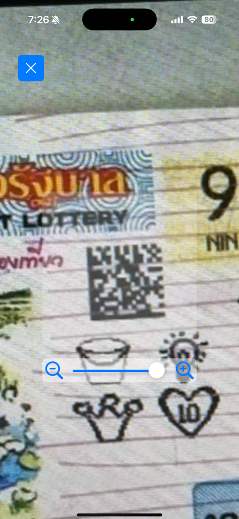 Thai National Lottery - A mobile app interface scanning a QR code on a Thai lottery ticket