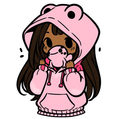 a girl holding a froggy hoodie