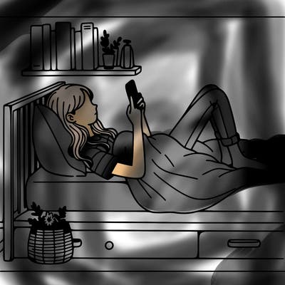 a girl laying on her bed with her phone
