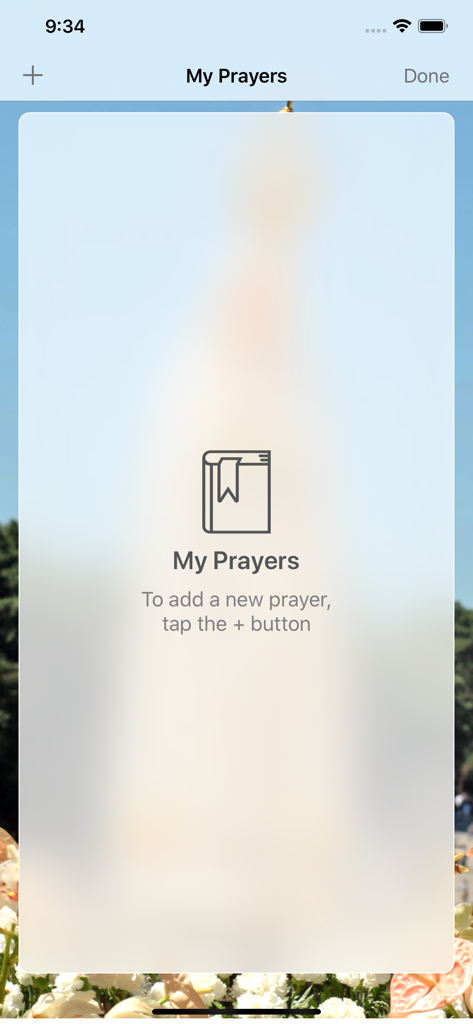 The Holy Rosary - Screenshot of the My Prayers section in The Holy Rosary app showing a book icon and an option to add personal prayers.