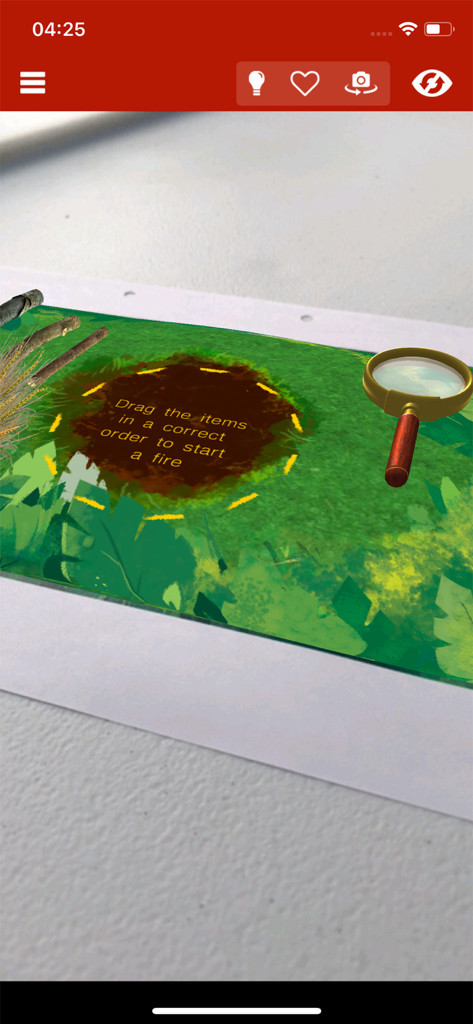 Zappar - La aplicación Zappar muestra un juego de aprendizaje interactivo de realidad aumentada sobre una superficie física