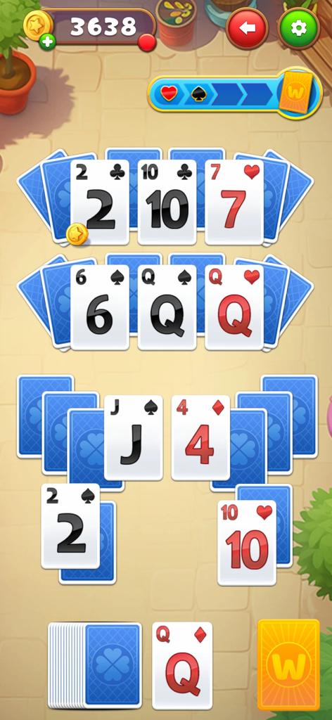 Kings and Queens: Solitaire - Un niveau de tripeaks solitaire dans Kings and Queens montrant des dispositions de cartes et une barre de progression.