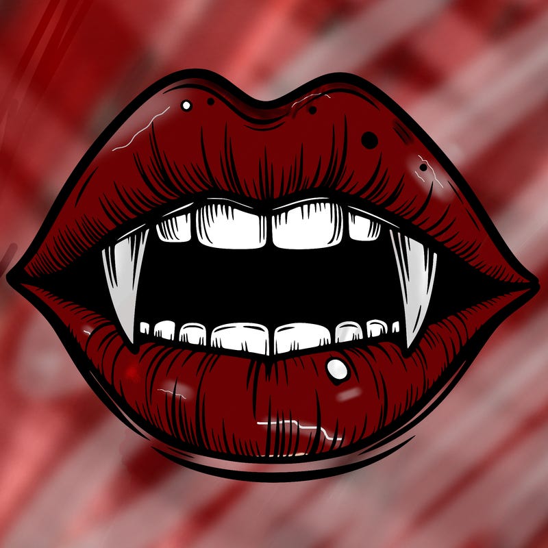 lips with vampire teeth