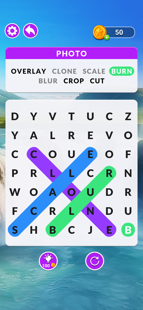 Word Search Puzzle - Scenery - Una pantalla de juego de sopa de letras con palabras como 'overlay', 'burn' y 'crop' sobre un fondo de océano escénico.