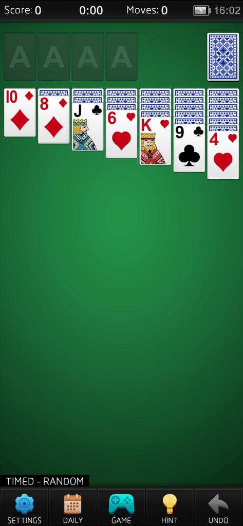 Classic Solitaire card game interface on a green background