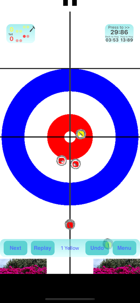CurlingSimulator - Top down view of red and yellow stones in the house of a curling simulator mobile game