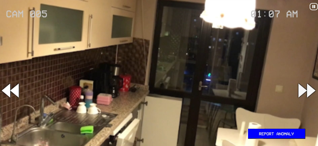 Paranormal Inc. - CCTV camera view of a kitchen at night with a report anomaly button in Paranormal Inc
