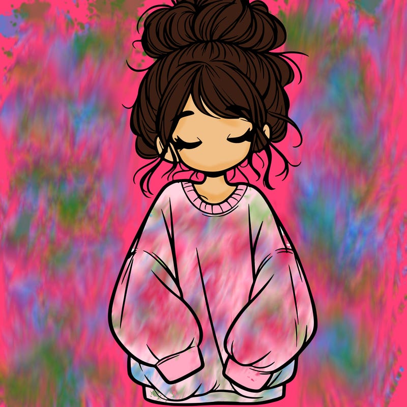 girl with baggy sweatshirt and messy bun