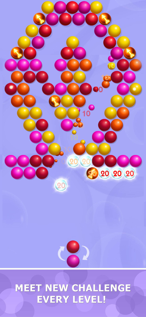 A colorful bubble shooter level with various patterned bubbles and gameplay text