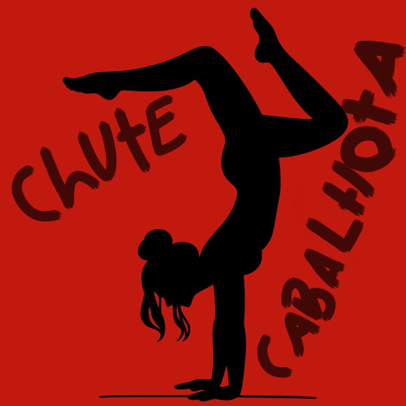 a woman doing a handstand