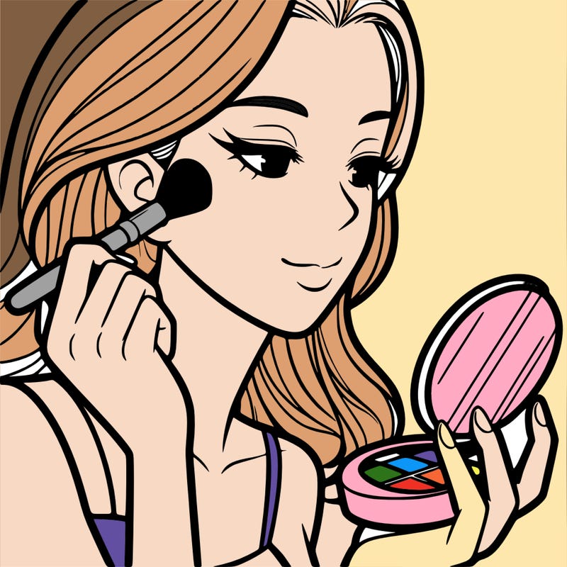 little girl putting on makeup