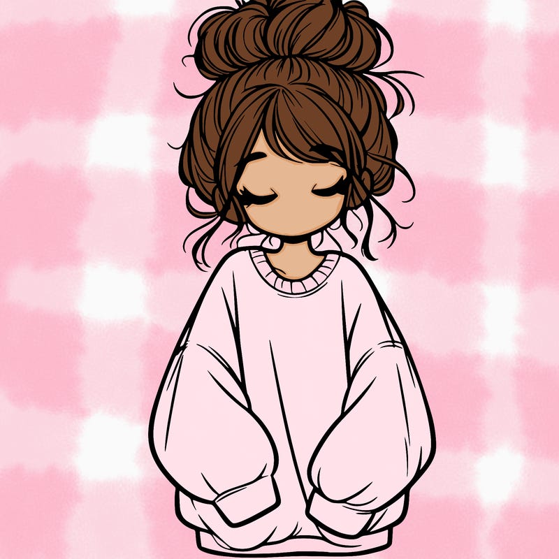 girl with baggy sweatshirt and messy bun