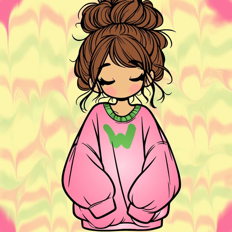 girl with baggy sweatshirt and messy bun