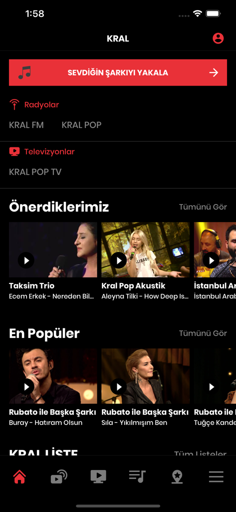 Schermata principale dell'app KRAL che mostra stazioni radio turche e raccomandazioni di video musicali