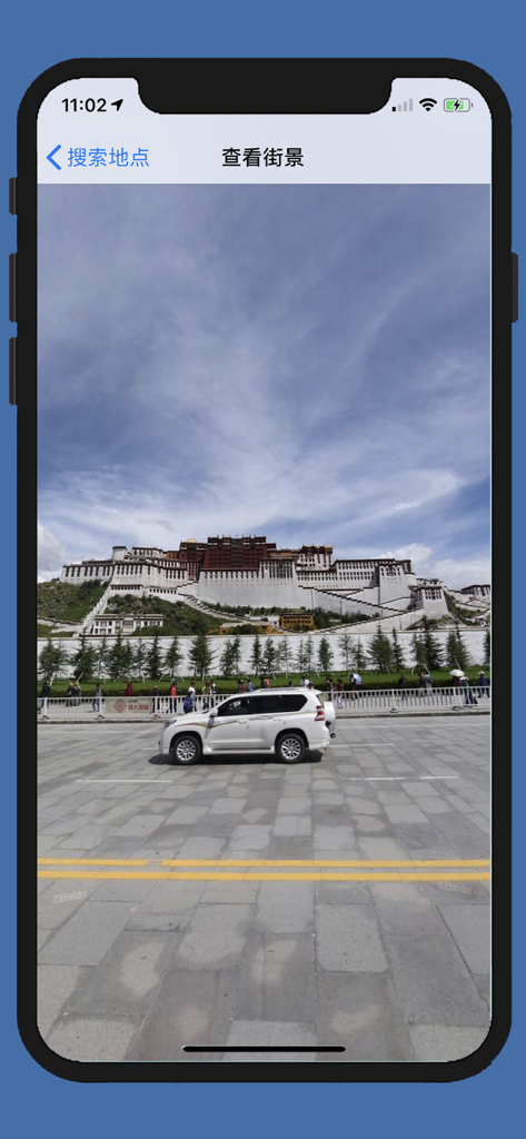 High resolution street view of the Potala Palace in Tibet shown on an iPhone screen.