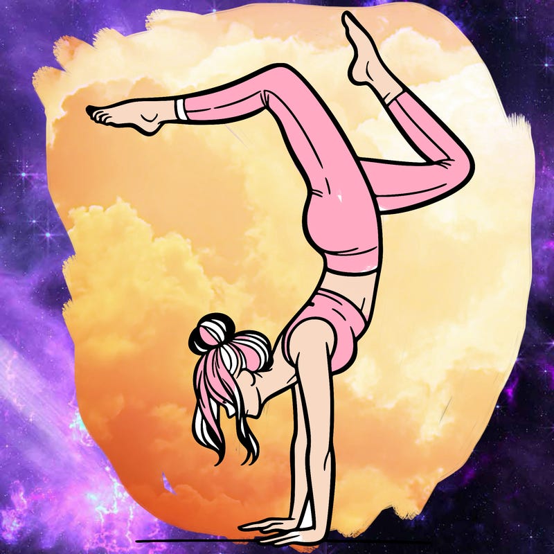 a woman doing a handstand