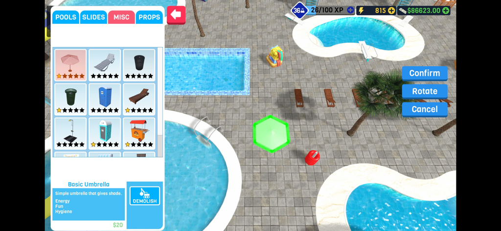 Interfaccia della modalità di costruzione in Waterpark Owner Simulator dove il giocatore sta posizionando un ombrellone vicino alle piscine