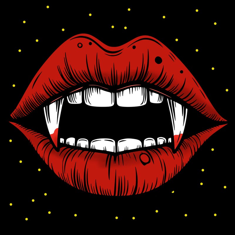 lips with vampire teeth