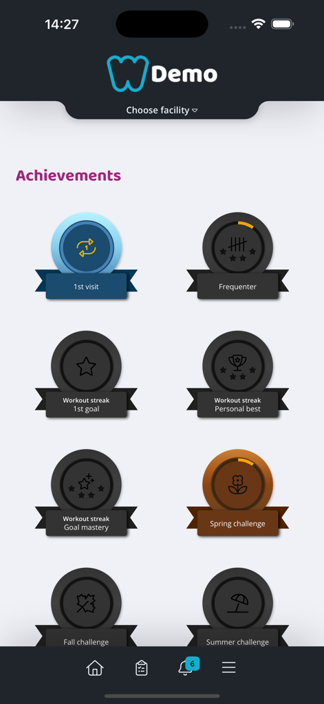 Wondr booking app - Achievements screen in the Wondr app showing various fitness badges and workout milestones.