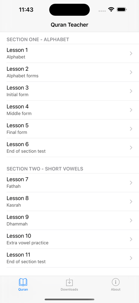A list of structured lessons in the Quran Teacher app covering the Arabic alphabet and short vowels.