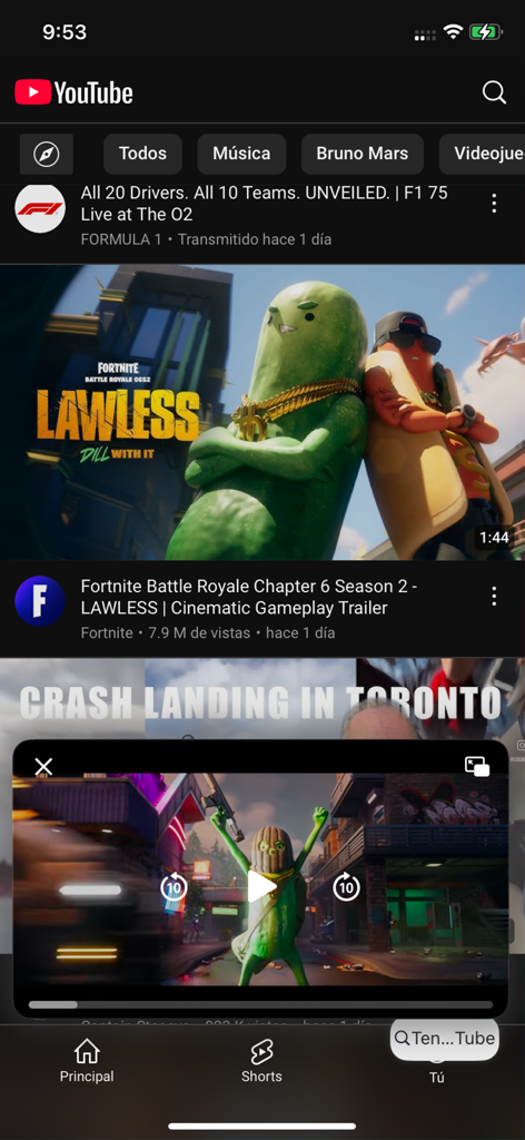 Float Tube：PiP for Video&Music - Ein mobiler Bildschirm zeigt die Float Tube App mit einem schwebenden Videofenster, das einen Trailer über der YouTube-Homepage abspielt.