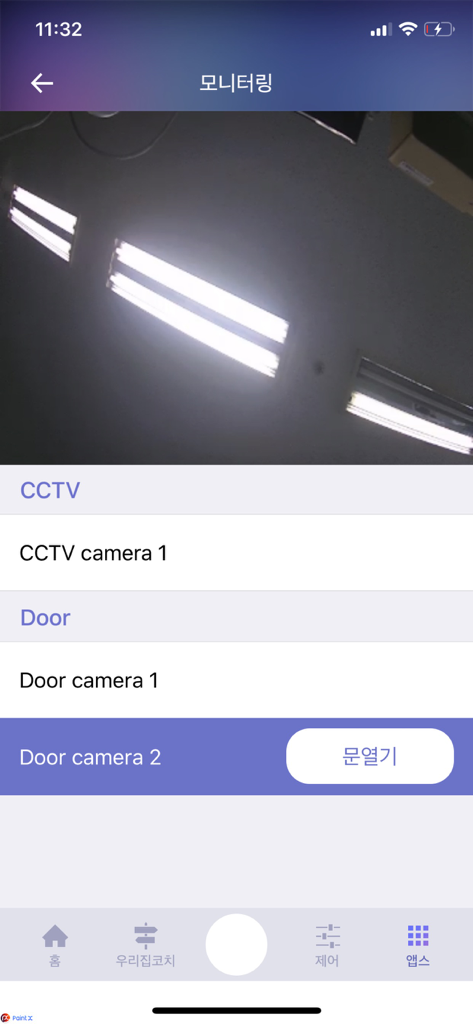 COMMAX IoT - Interface of the COMMAX IoT app showing home security camera feeds and door access controls