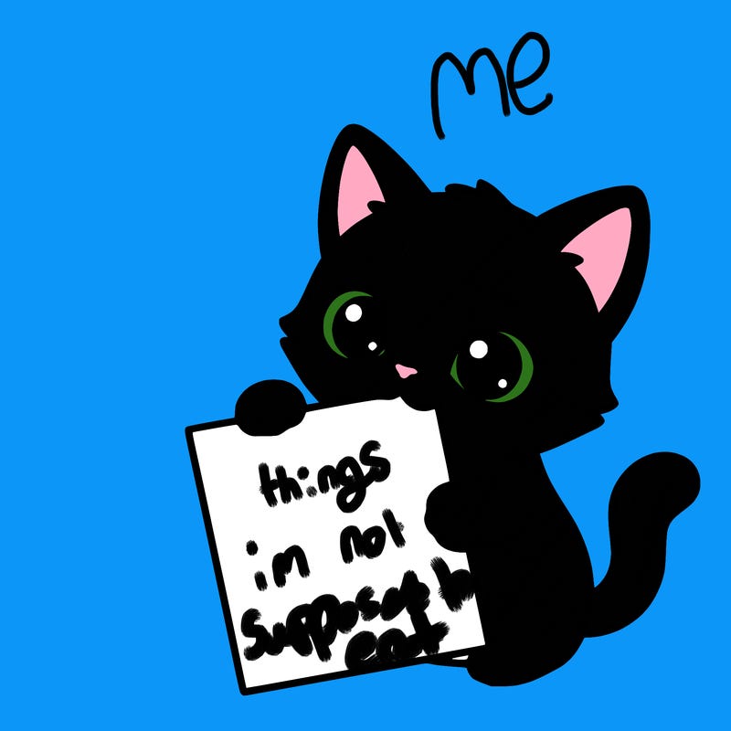 a small cat with a blank sheet of paper in its hand. the cat is sooooooo cute!