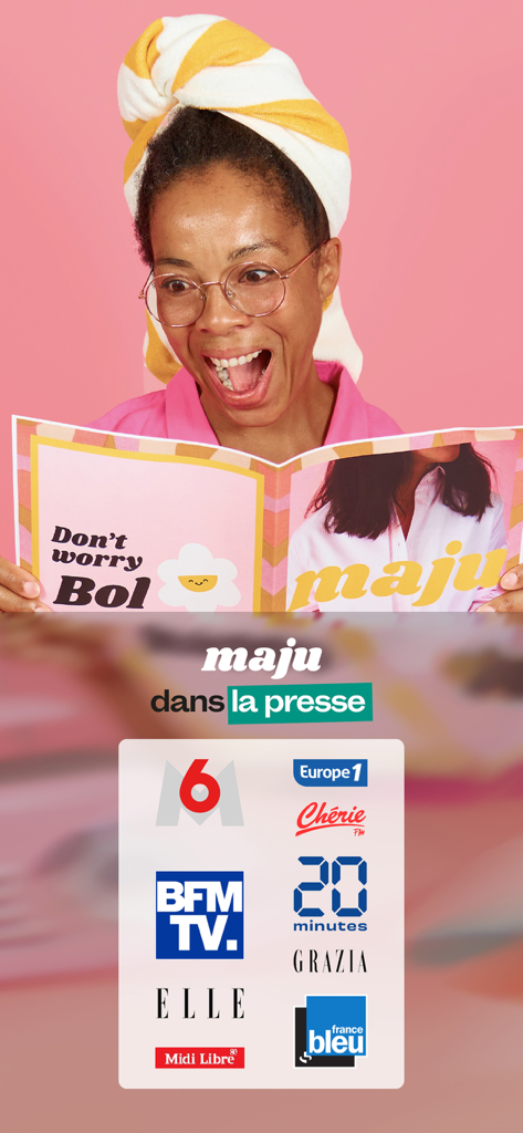 A happy woman holding a brochure above logos of major media outlets featuring the maju nutrition app