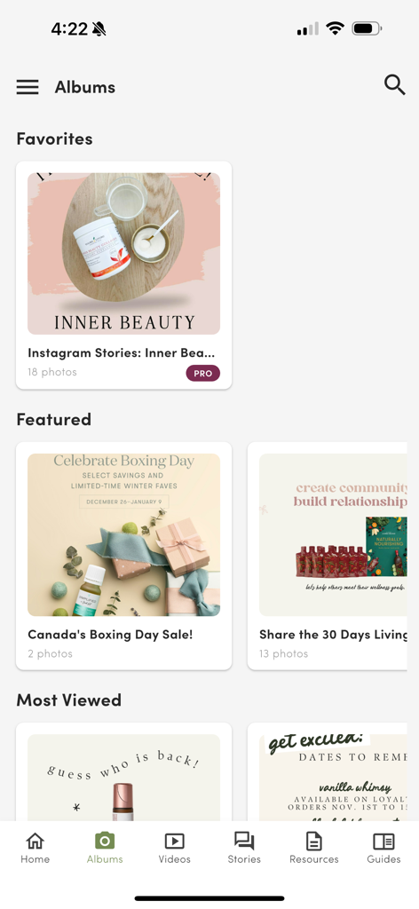Life Steps app Albums screen showing marketing guides and social media assets for Young Living products