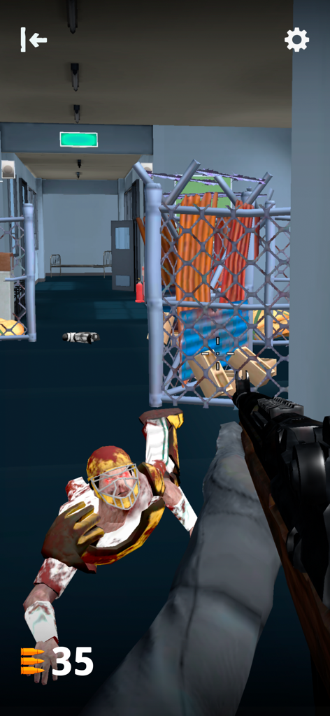 First person shooter gameplay showing a player aiming a rifle at a crawling zombie in football gear