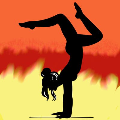 a woman doing a handstand