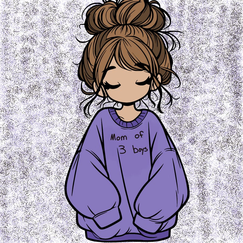 girl with baggy sweatshirt and messy bun