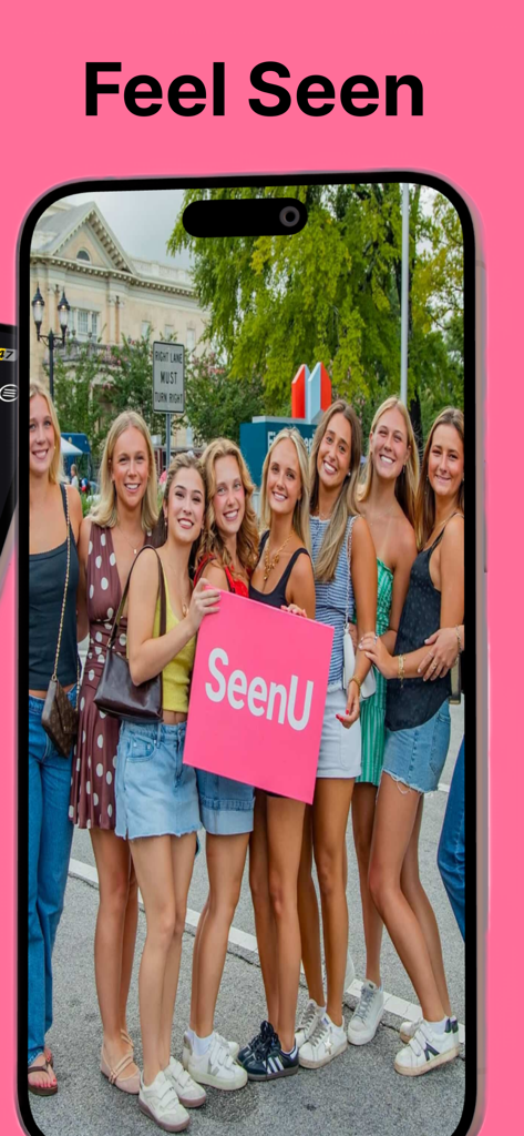 SeenU - A group of young women holding a pink SeenU sign at an outdoor event with the headline Feel Seen