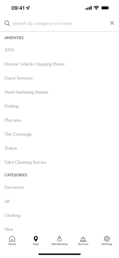 Mobile app screen showing a search menu for Kildare Village amenities and shopping categories