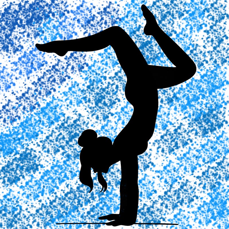 a woman doing a handstand