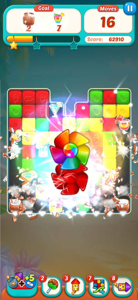 Fruit Cube Blast: Match 3 Game - Gameplay screenshot of Fruit Cube Blast showing a colorful pinwheel power-up exploding and clearing fruit blocks on a beach-themed puzzle board.