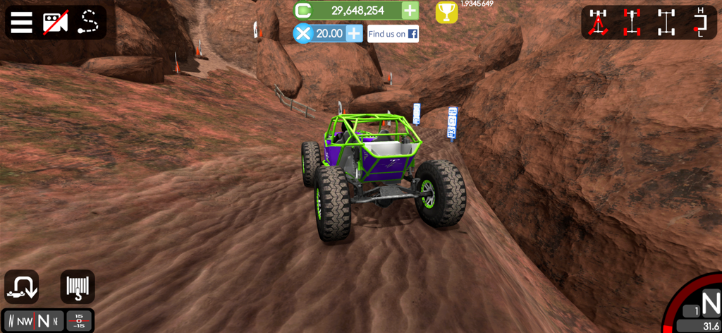 Un buggy personalizzato verde che percorre uno stretto canyon nel deserto nel gioco Gigabit Offroad.