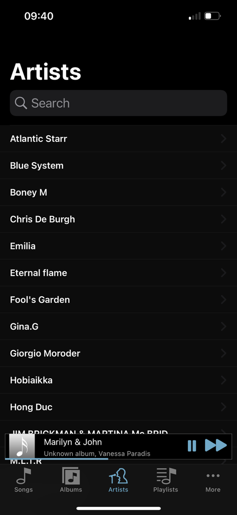 FLAC Player+ - Artists list view in FLAC Player plus app showing a dark mode user interface