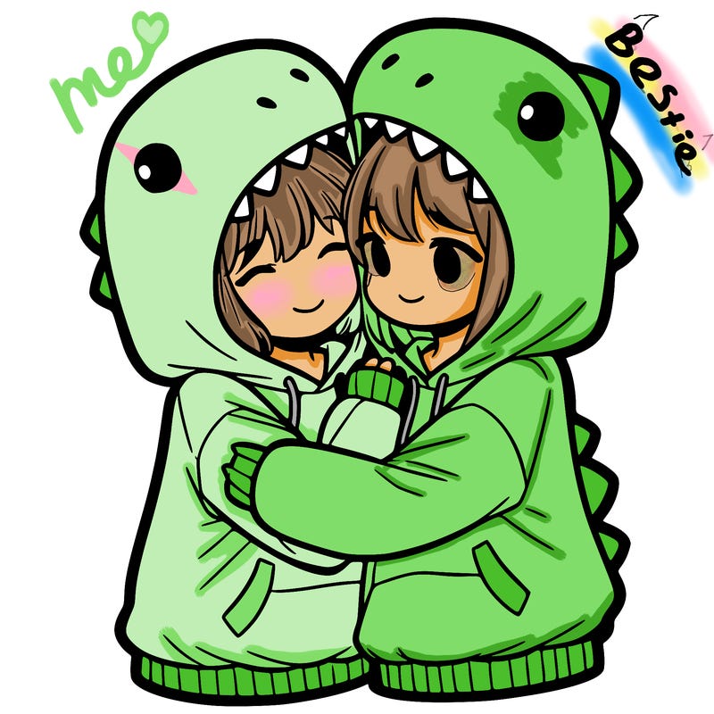 two girls hugging each other in dinosaur hoodies