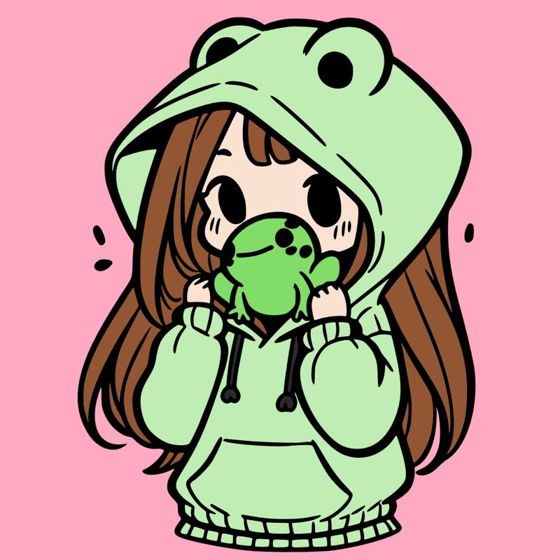 a girl holding a froggy hoodie