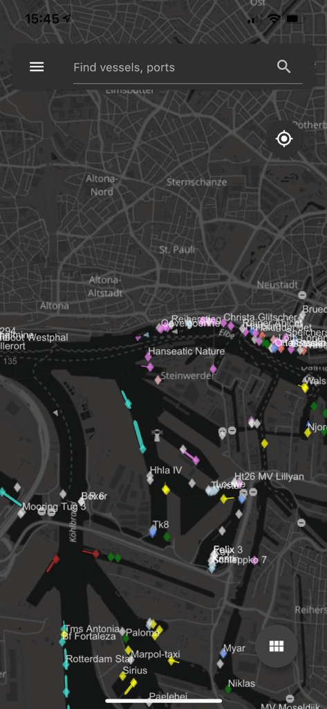 vesseltracker.com mobile - Real-time vessel tracking map showing ship positions in dark mode on the vesseltracker.com mobile app.