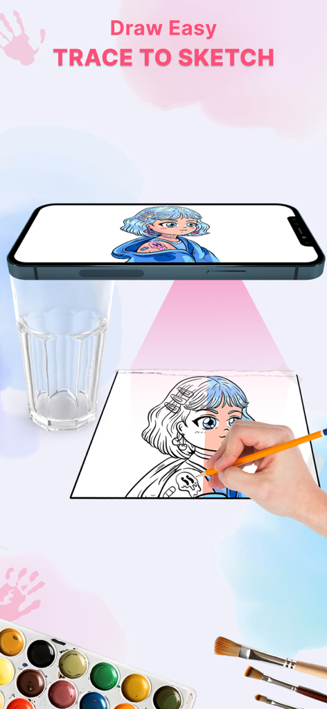 スマートフォンでAR描画アプリを使用して、作業スペースの上にバランスを取って、紙にアニメキャラクターをトレースしている手。