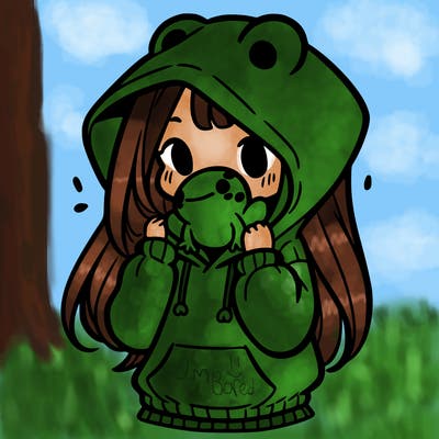 a girl holding a froggy hoodie