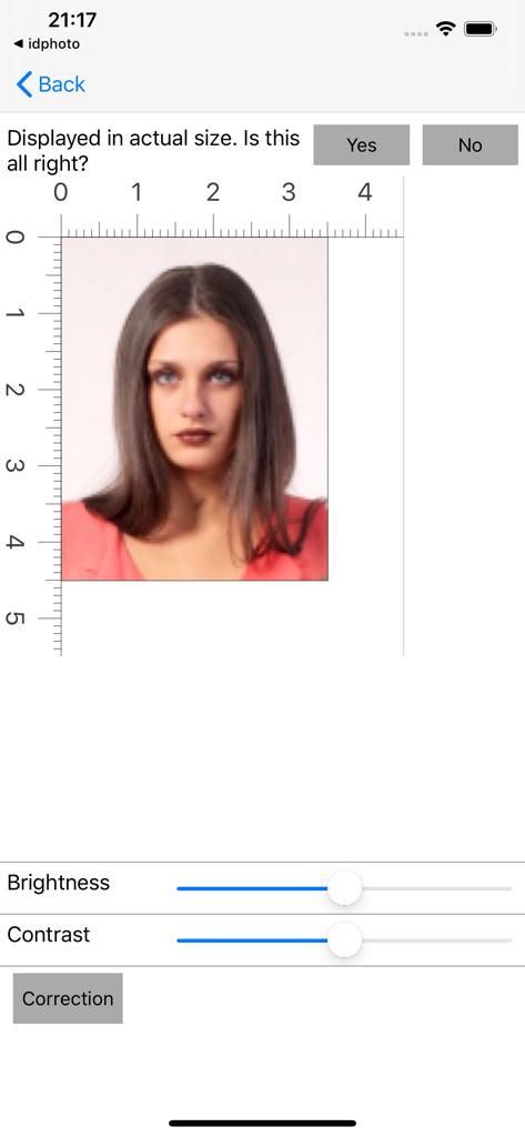 ID Photo application - Mobile interface for adjusting brightness and contrast on a passport photo with a size scale