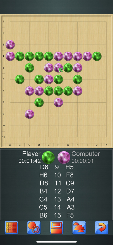 Gomoku V+, 5 in a line game. - Gomoku V plus gameplay showing a match against the computer on a wooden board grid with green and purple pieces.