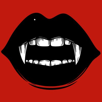 lips with vampire teeth